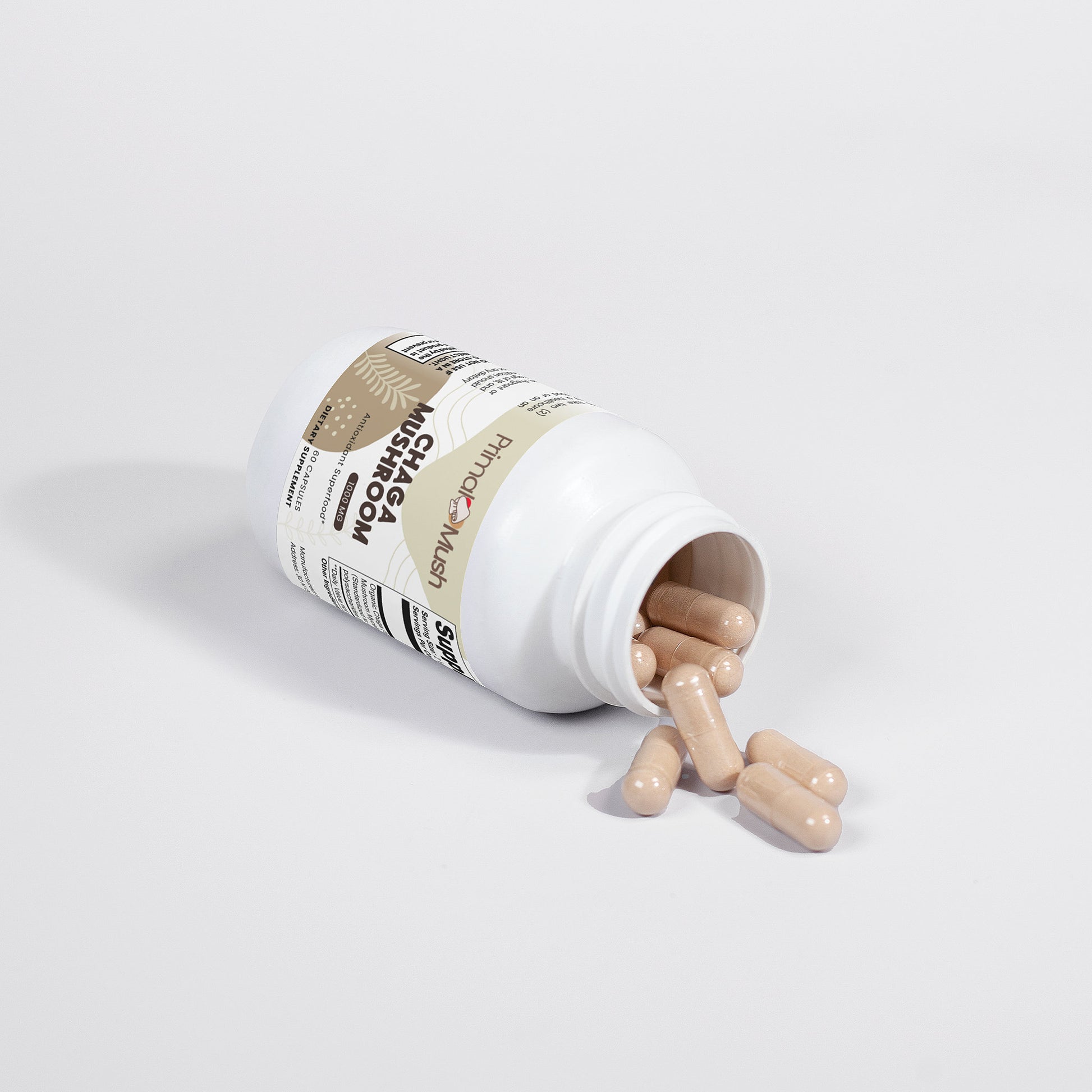 Supplement bottle with pills spilling out on a light gray background
